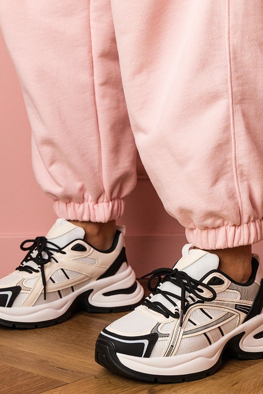 Biało-czarne sneakersy sportowe na... Biało-czarne sneakersy sportowe na...