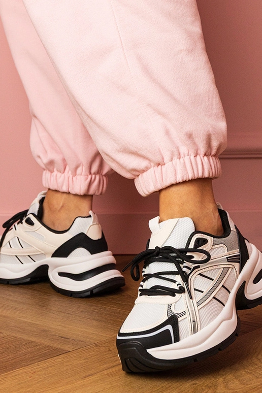 Biało-czarne sneakersy sportowe na... Biało-czarne sneakersy sportowe na...
