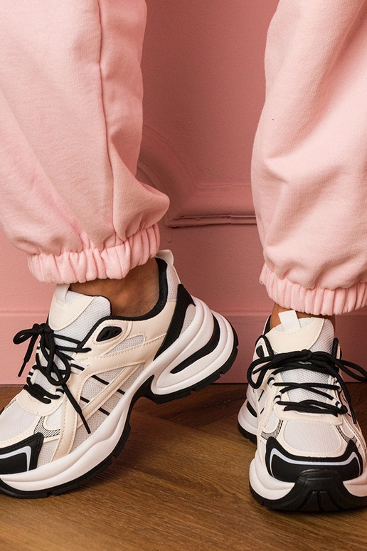 Biało-czarne sneakersy sportowe na... Biało-czarne sneakersy sportowe na...