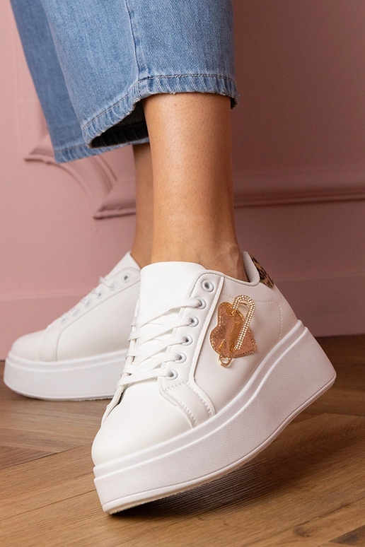 Białe sneakersy z panterkowym... Białe sneakersy z panterkowym...