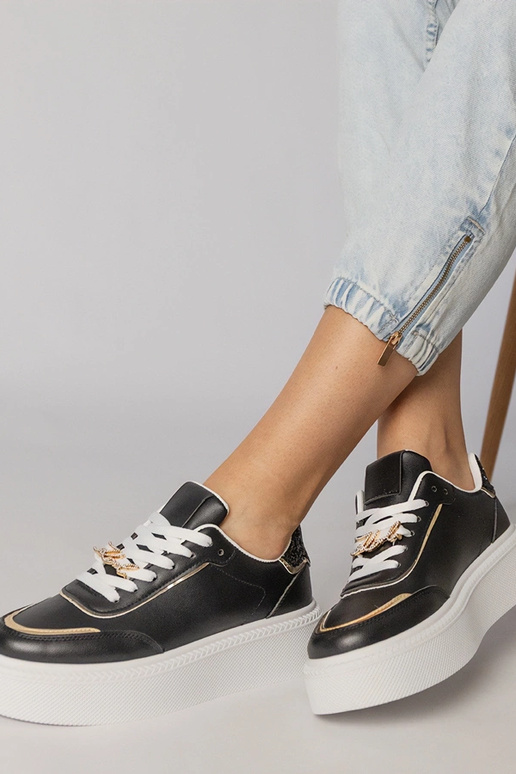 Czarne sneakersy zdobione brokatem i...