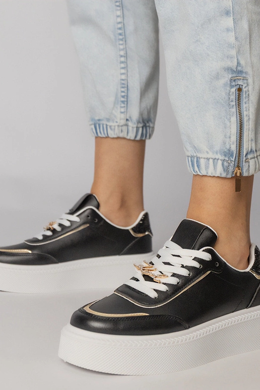 Czarne sneakersy zdobione brokatem i...