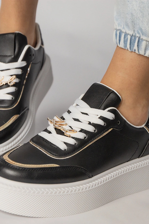 Czarne sneakersy zdobione brokatem i...