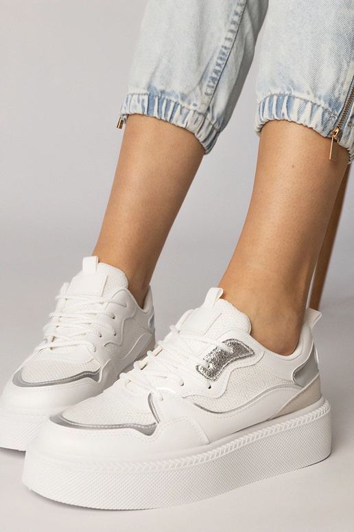 Białe sneakersy z materialową wstawką...