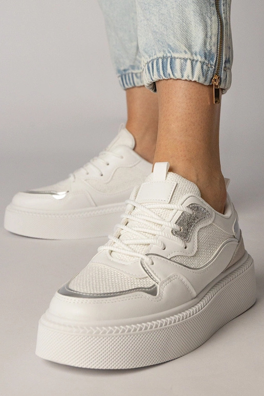 Białe sneakersy z materialową wstawką...