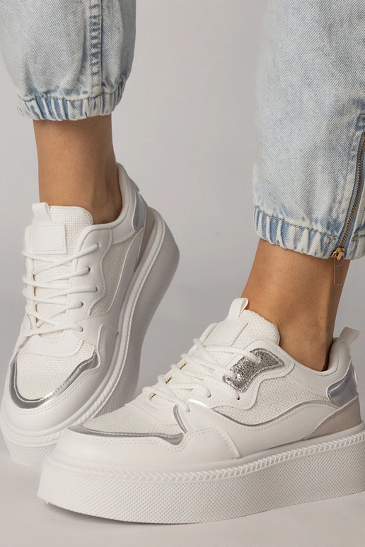 Białe sneakersy z materialową wstawką...