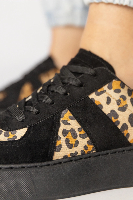 Czarno-panterkowe sneakersy damskie...