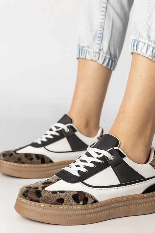 Czarno-białe sneakersy z panterkowym...