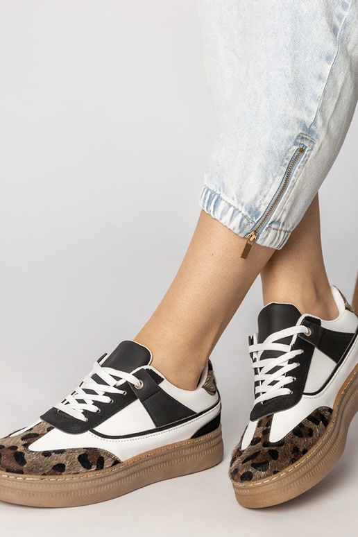 Czarno-białe sneakersy z panterkowym...
