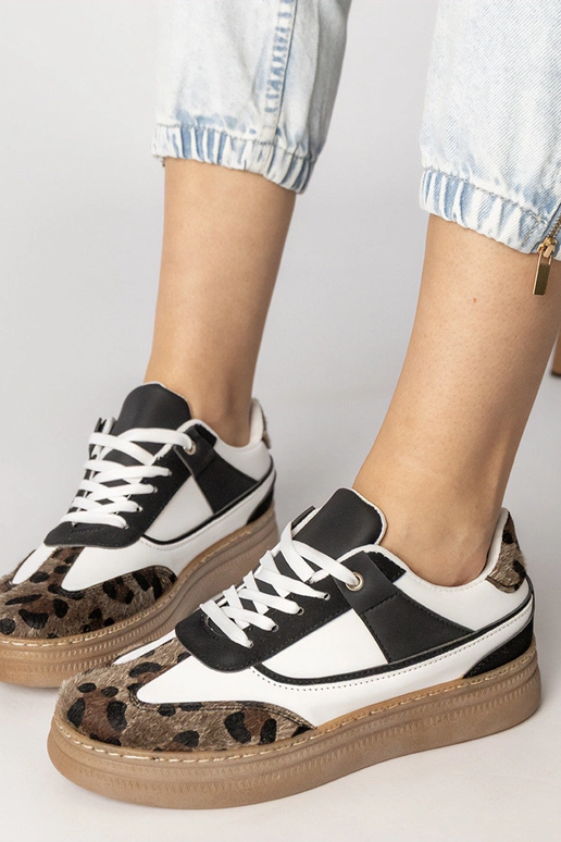 Czarno-białe sneakersy z panterkowym...
