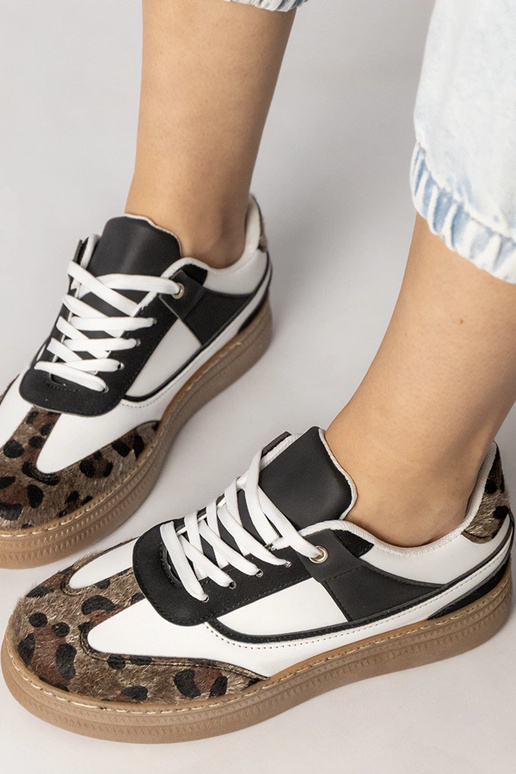 Czarno-białe sneakersy z panterkowym...