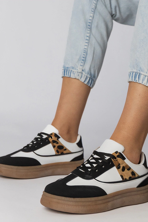Biało-czarne sneakersy z panterkowym...