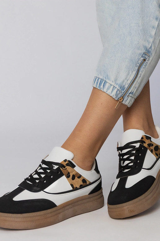 Biało-czarne sneakersy z panterkowym...