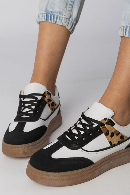 Biało-czarne sneakersy z panterkowym...