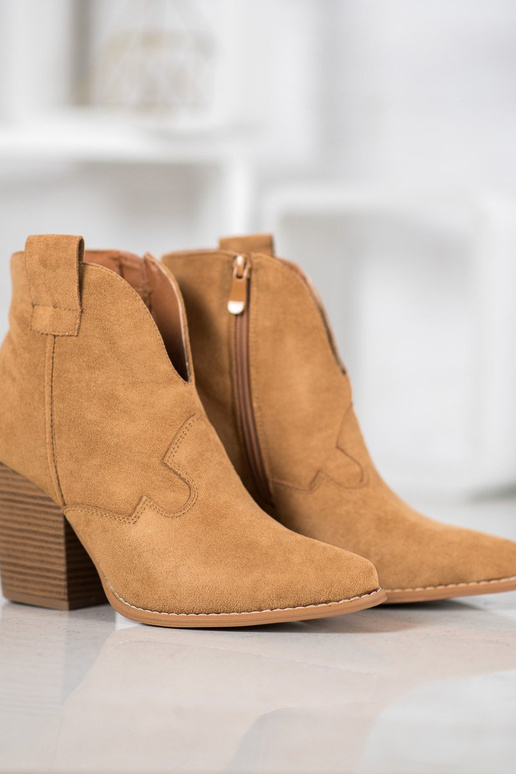 suede CoInboy style boots Inith heels suede CoInboy style boots Inith heels