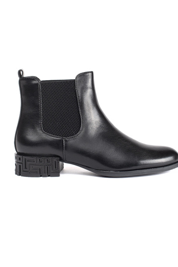 black Chelsea boots Inith a...