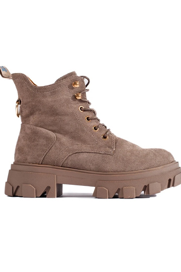 of suede Inomens boots on a...