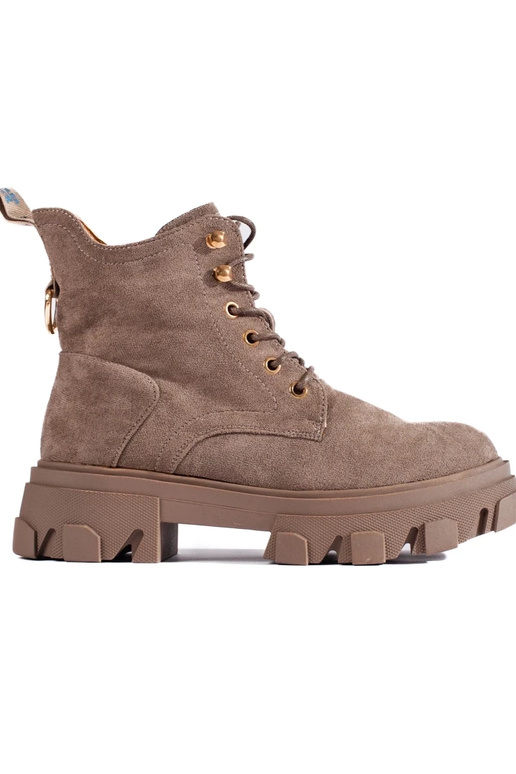 of suede Inomens boots on a thick sole