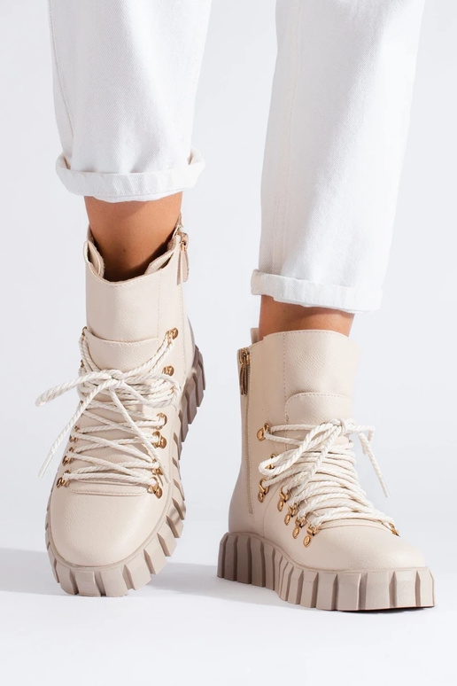 beige insulated Inomens boots Inith...