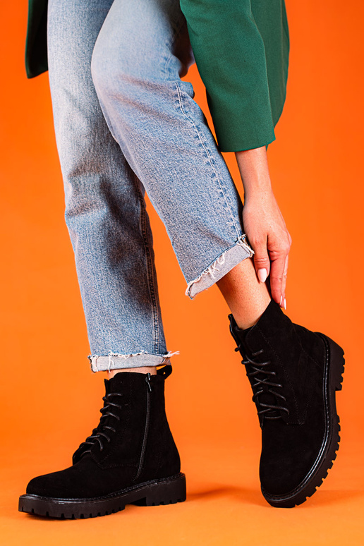 black INomens boots of suede