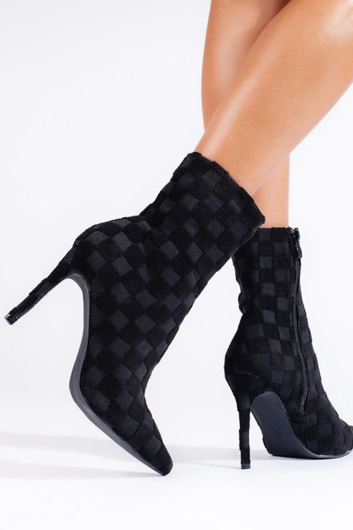 High fitted Inomens boots on a high... High fitted Inomens boots on a high...