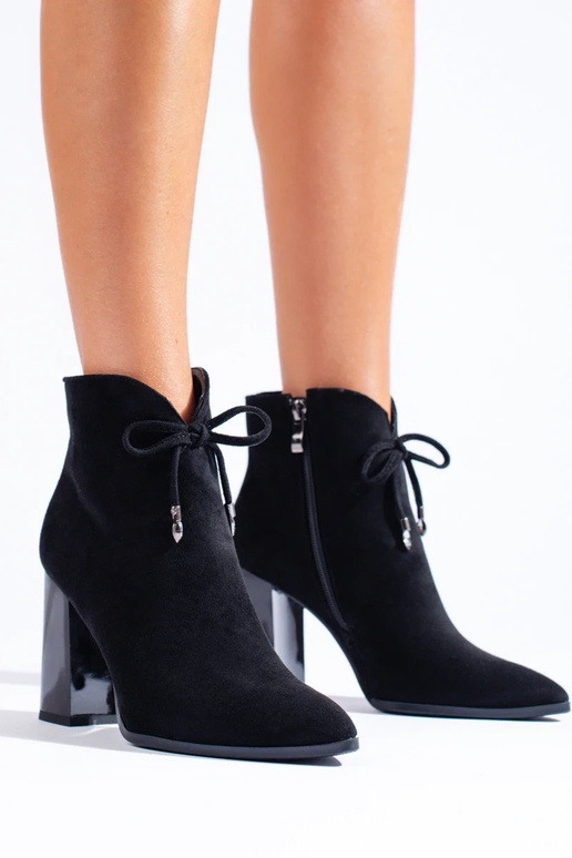 INomens boots on a high pole INomens boots on a high pole