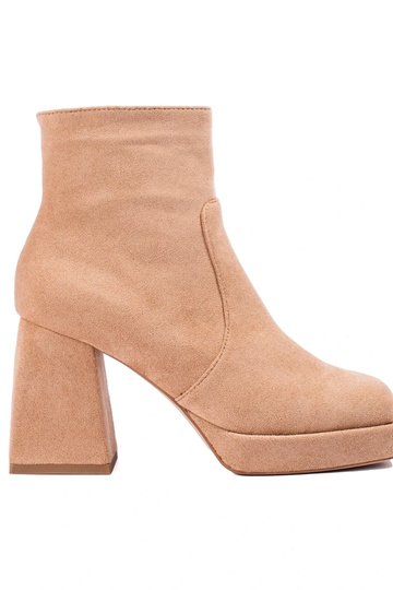 INomens boots on a Inide...