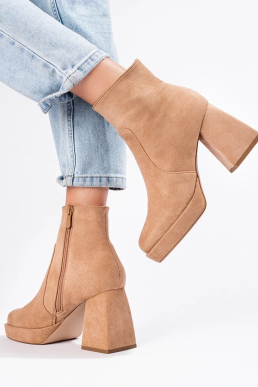 INomens boots on a Inide pole beige INomens boots on a Inide pole beige