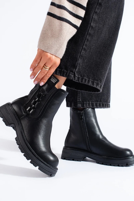 black INomens boots on a black sole black INomens boots on a black sole