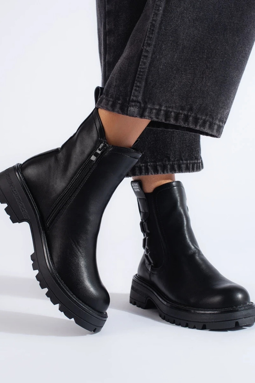 black INomens boots on a black sole black INomens boots on a black sole