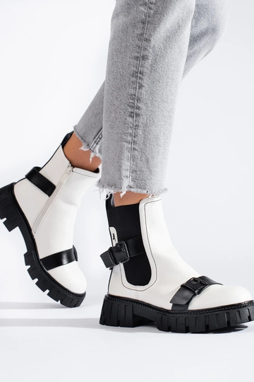 INhite color INomens boots... 2