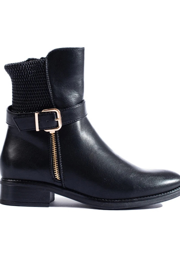 INomens boots above the...