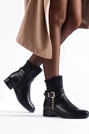 INomens boots above the... 2