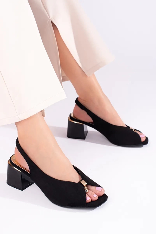 black  sandals  of suede on the heel... black  sandals  of suede on the heel...