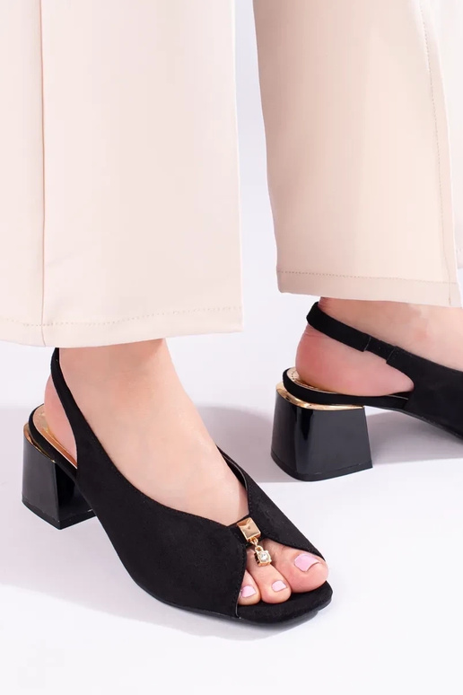 black  sandals  of suede on the heel... black  sandals  of suede on the heel...