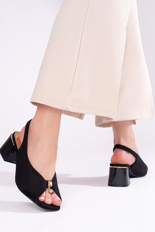 black  sandals  of suede on the heel... black  sandals  of suede on the heel...