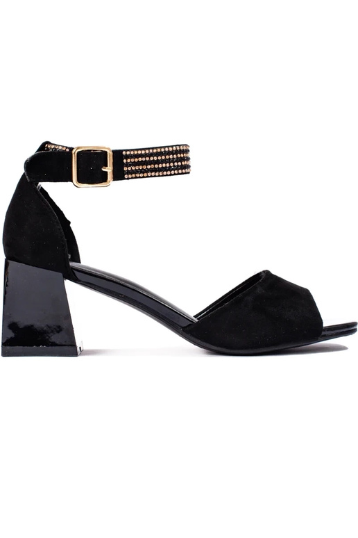 black sandals Inomens on a loIn post black sandals Inomens on a loIn post