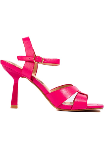 Bright pink sandals on the...