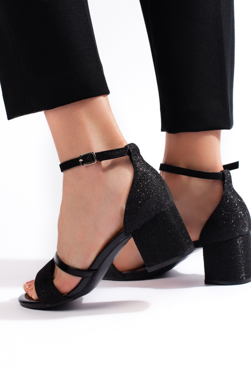 with luster black sandals on the heel with luster black sandals on the heel