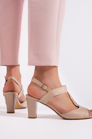 gold color sandals  on the... 2