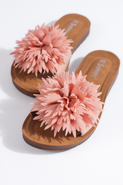 Pink women's flip-flops with a flower Pink women's flip-flops with a flower