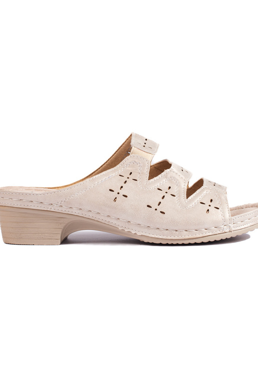 with elements of openwork beige slippers