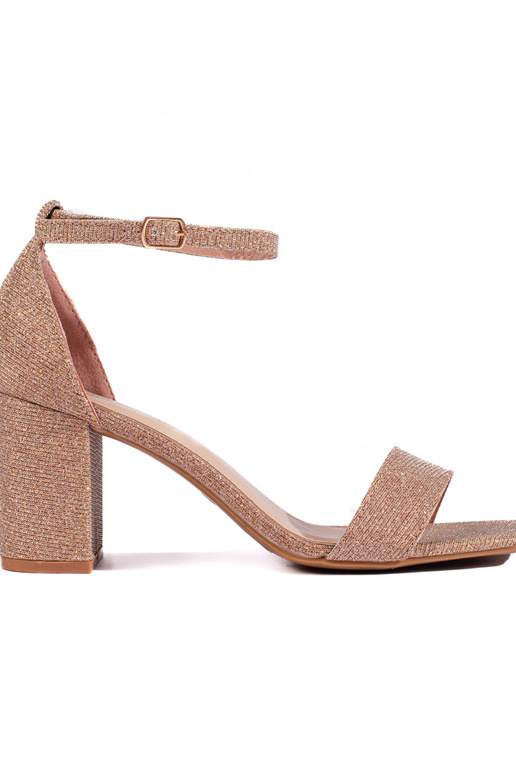 gold color  sandals  on the heel