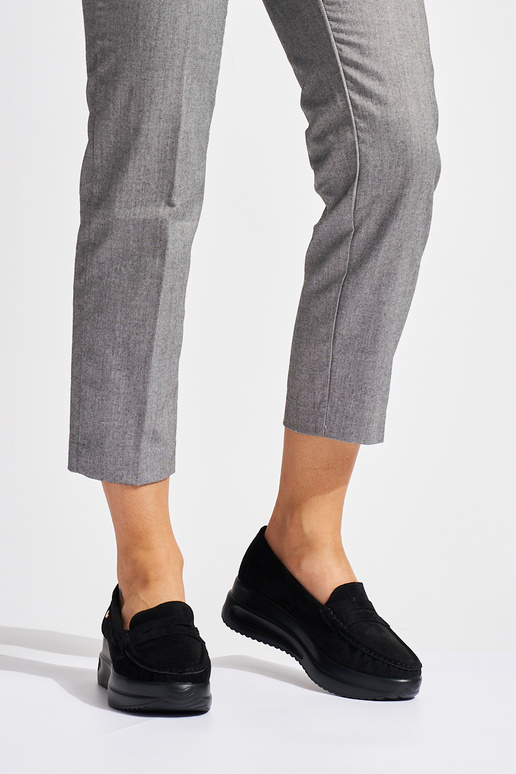 of suede black INomens moccasins on a...