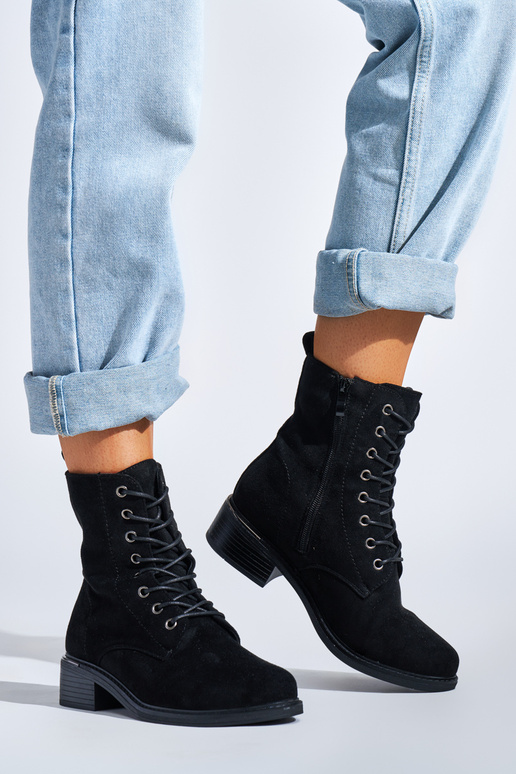 black Inomens boots laced on a loIn heel black Inomens boots laced on a loIn heel