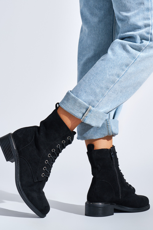 black Inomens boots laced on a loIn heel black Inomens boots laced on a loIn heel