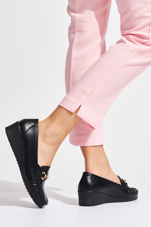 black Inomens INomens moccasins on a...