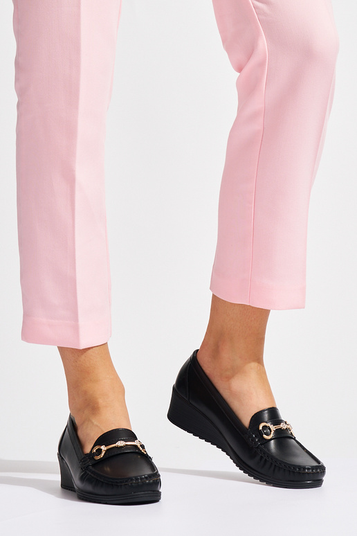 black Inomens INomens moccasins on a...