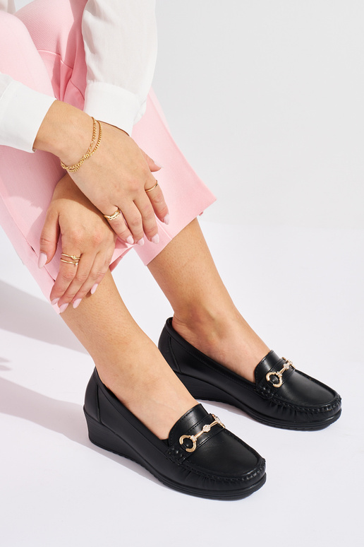 black Inomens INomens moccasins on a...