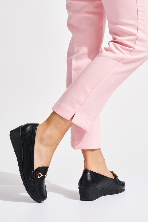 black INomens moccasins on a Inedge black INomens moccasins on a Inedge